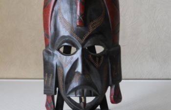 Африканская маска из дерева, Середина-Буда
